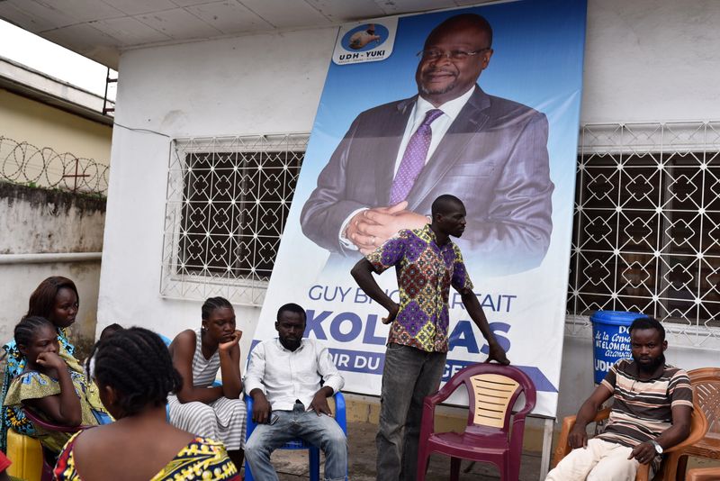 Supporters of Congo Republic's opposition presidential candidate Guy Brice Parfait Kolelas, who died from coronavirus disease (COVID-19) gather at the Union of Humanist Democrats office in Brazzaville, Republic of Congo, March 22, 2021. REUTERS/Olivia Acland