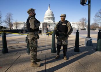 WASHINGTON, DC - JANUARY 07: DC National Guard guardsmen stand outside the U.S. Capitol on January 07, 2021 in Washington, DC. Supporters of President Trump had stormed and desecrated the building the day before as Congress debated the a 2020 presidential election Electoral Vote Certification.   John Moore/Getty Images/AFP