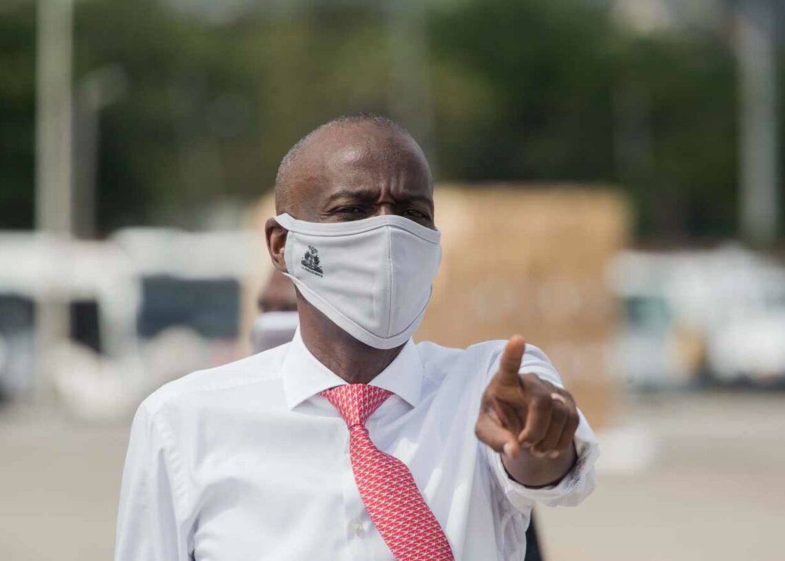 (FILES) In this file photo taken on May 7, 2020 Haitian President Jovenel Moise instructs staff members on the tarmac of  Toussaint Louverture International Airport in Port-au-Prince, as coronavirus aid from China arrives in a cargo plane.  The United States on February 5, 2021 accepted unpopular Haitian President Jovenel Moise's claim to hold power for another year but urged restraint and fresh elections. / AFP / Pierre Michel Jean