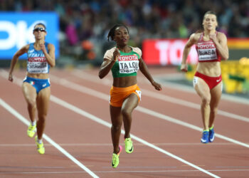 LONDON, ENGLAND - AUGUST 08:  Marie-Josee Ta Lou of the Ivory Coast competes in the Women's 200 metres heats during day five of the 16th IAAF World Athletics Championships London 2017 at The London Stadium on August 8, 2017 in London, United Kingdom.  (Photo by Alexander Hassenstein/Getty Images for IAAF)